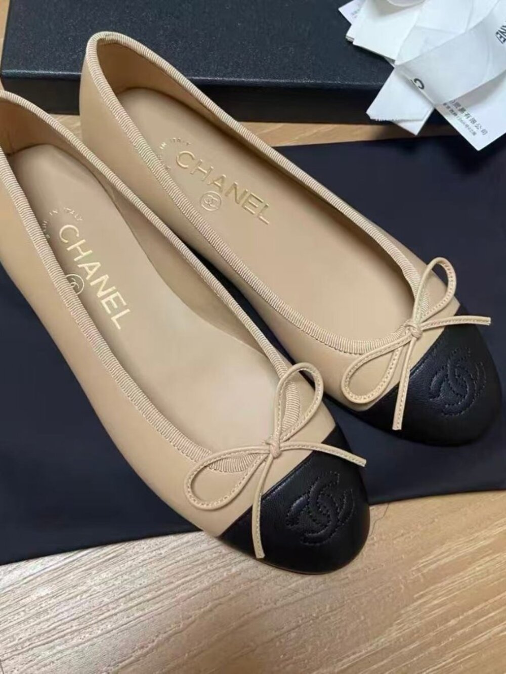 Chanel Beige Black Cap‑Toe CC Bow Leather Ballet Flats
